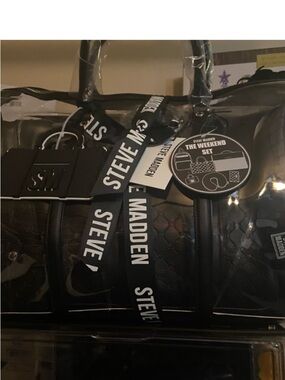 Steve Madden Clear Tote with Black Branded Strap last one